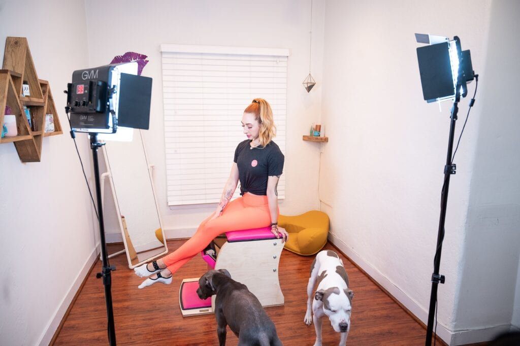 Lesley Logan filming an online Pilates class for a Wunda Chair workout